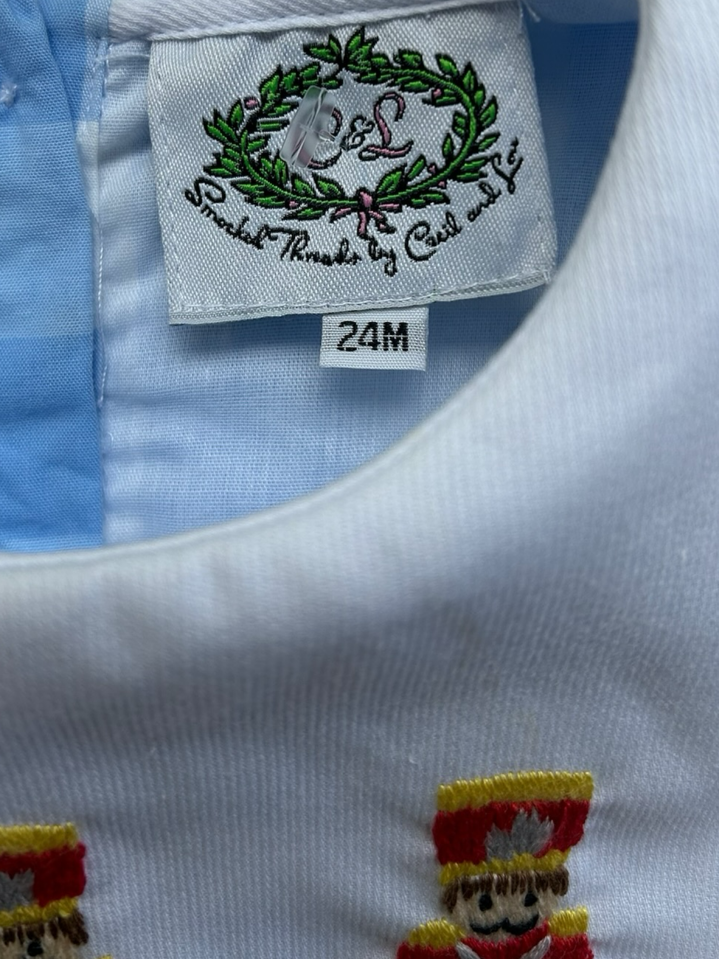 24M Baby Boys Blue Smocked Threads By Cecil & Lou Embroidered Soldiers Long Sleeve Romper.