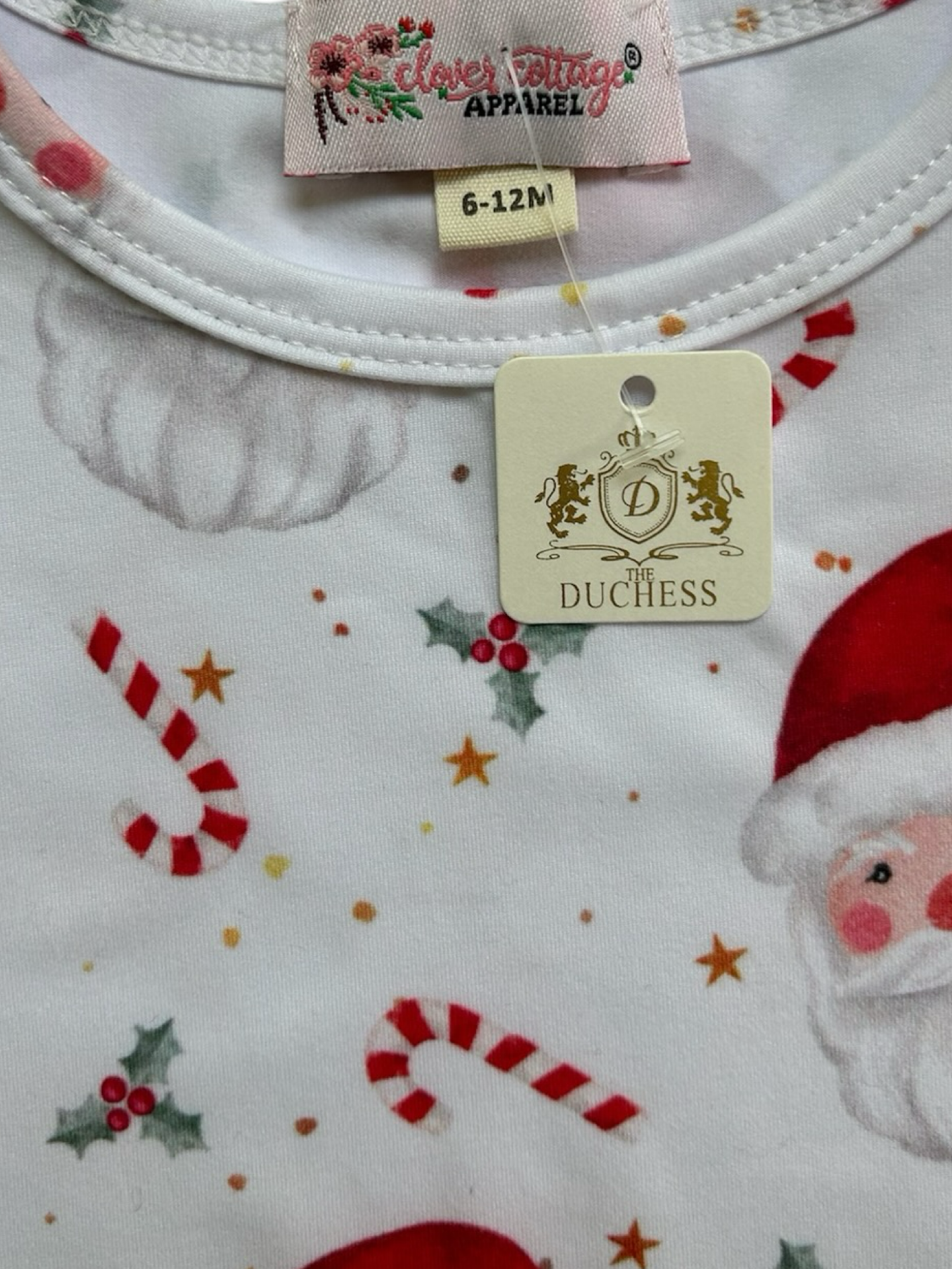 6M-12M Baby Girls Clover Cottage Santa Ruffle Romper.