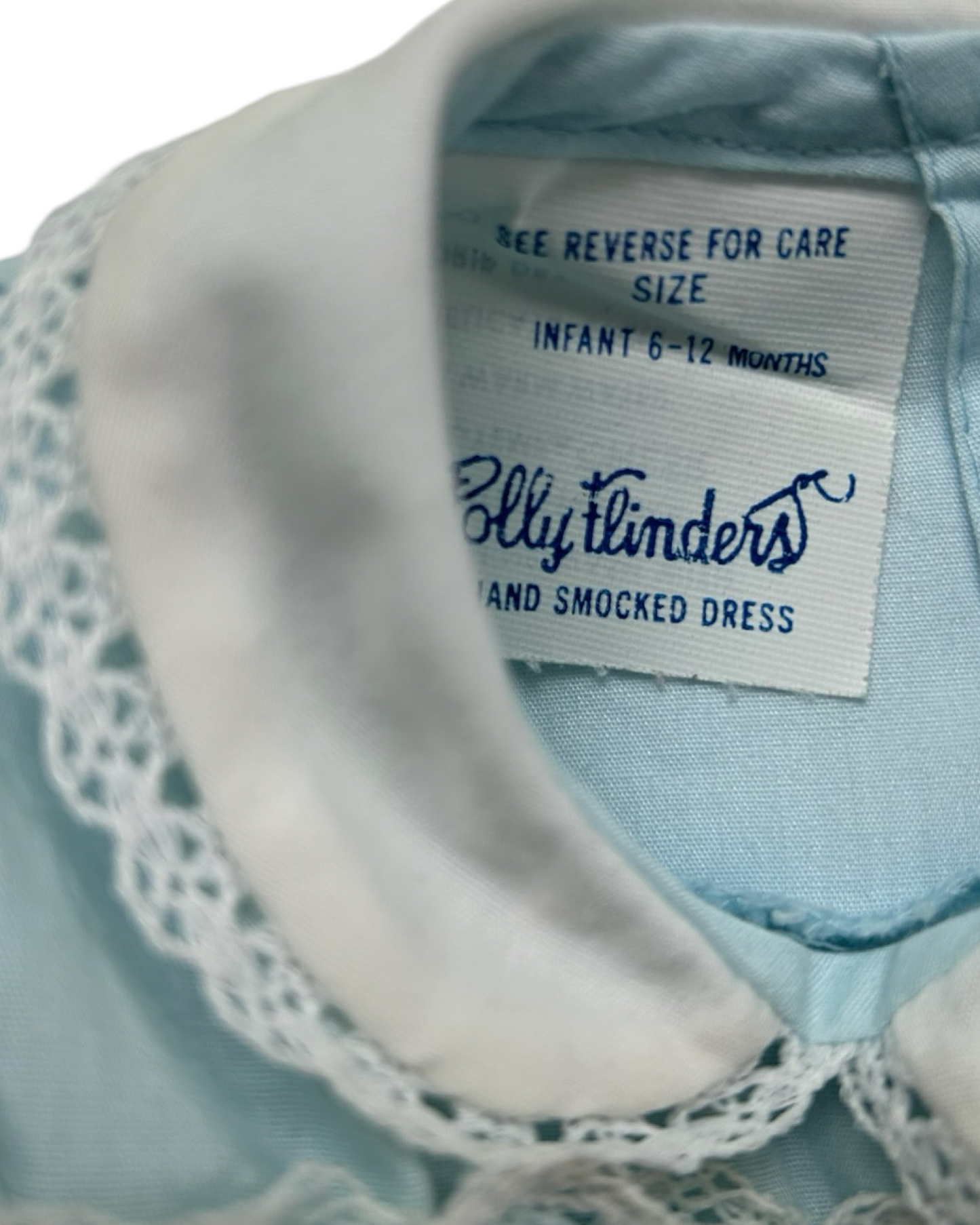 6M-12M Baby Girl Vintage Polly Flinders Blue Hand Smocked Dress.