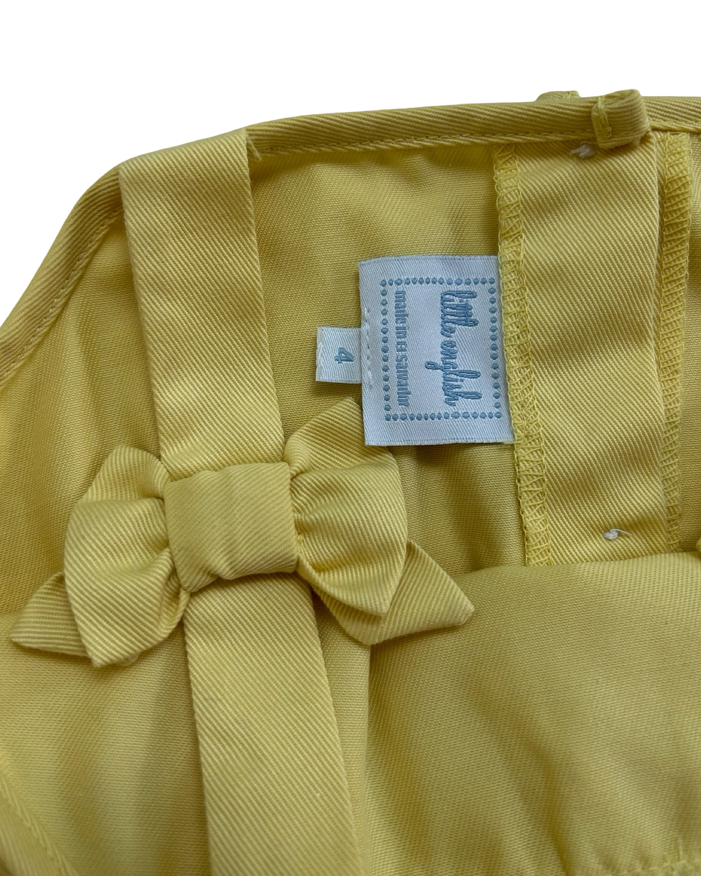 4 Toddlers Girls Little English Yellow Romper With Eyelets Trim.